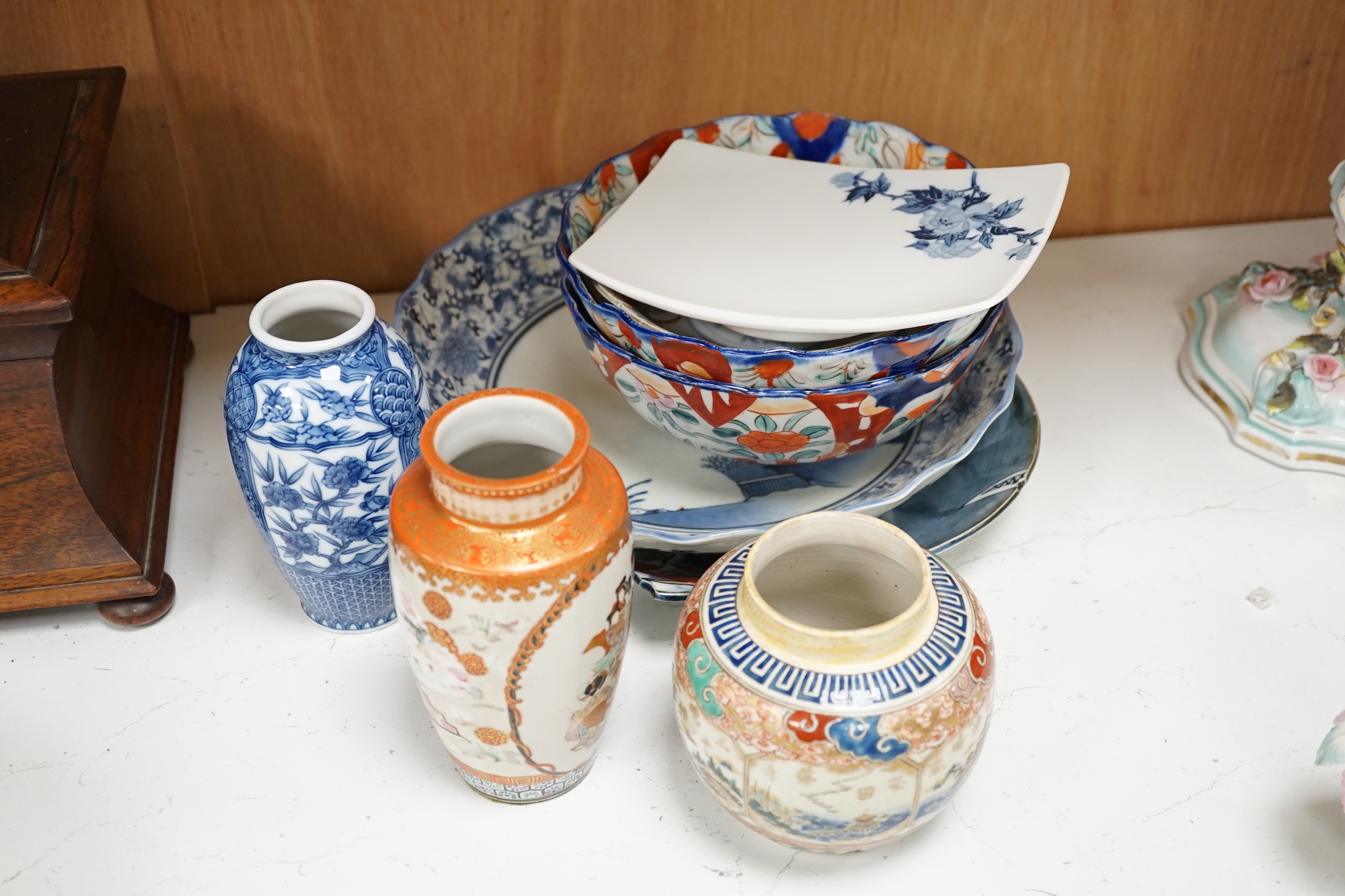 A group of Japanese and Korean ceramics, 18th century and later, to include an Arita blue and white scalloped dish, and Imari fish dish etc.